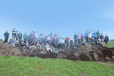 The team sitting on a spoil heap