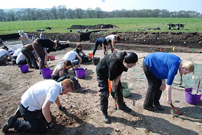 Archaeologists excavating